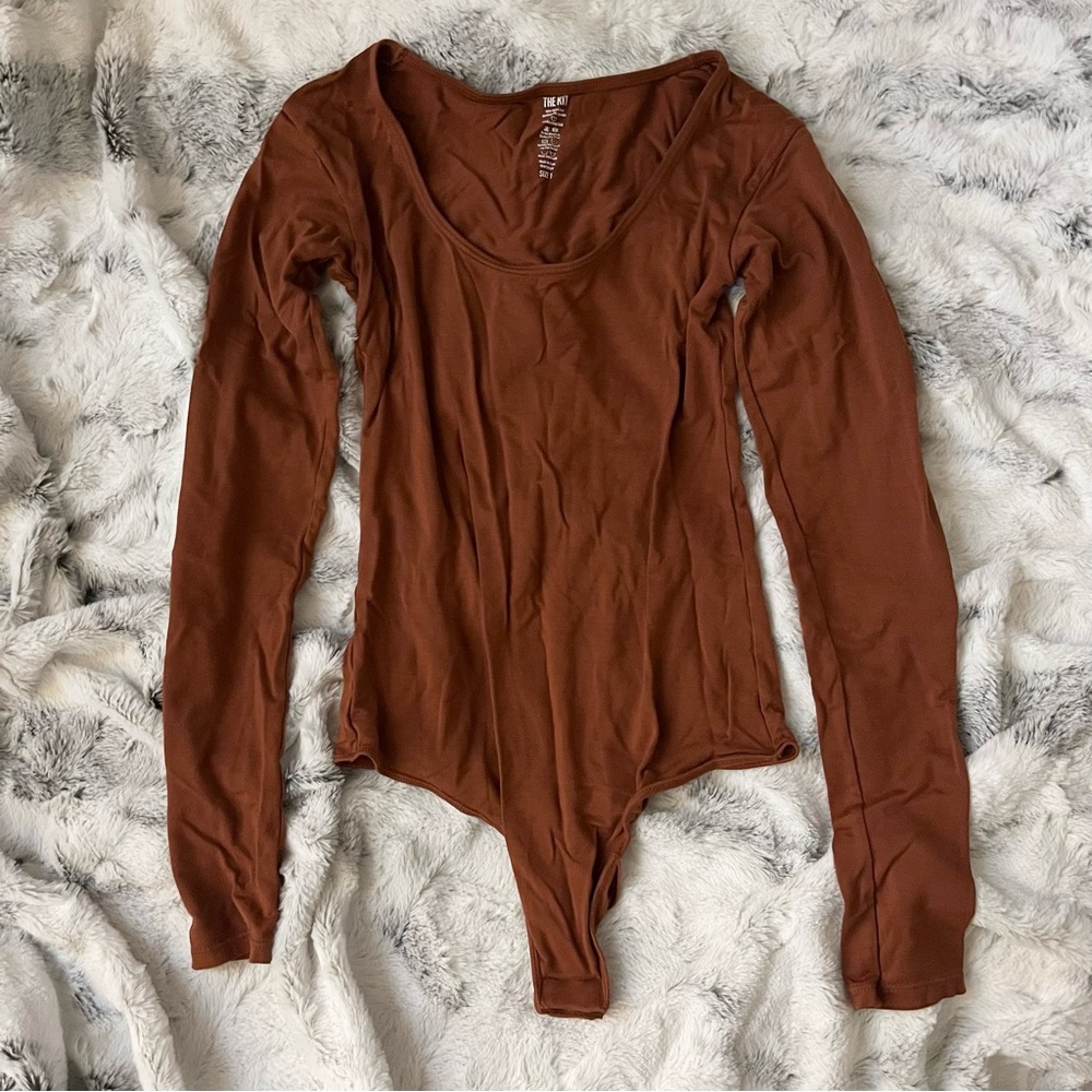 The Kit Undergarments Long Sleeve Thong Bodysuit in Cinnamon